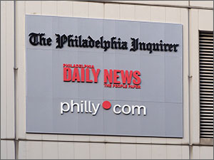 Exterior building sign of The Philadelphia Inquirer and Daily News.