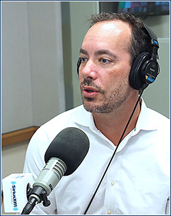 Zachary Meisel, a Penn Medicine emergency physician, in the Wharton School/Sirius radio studio