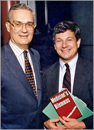 John Eisenberg, MD, and Penn Professor William Kissick, MD, MPH, celebrating the release of Kissick's book, 'Medicine's Dilemmas: Infinite Needs Versus Finite Resources.' 