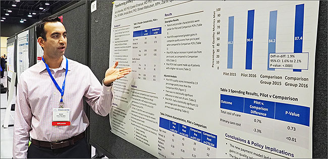 Amol Navathe, MD, PhD, with a poster of his award-winning abstract at the 2018 AcademyHealth Annual Research Meeting