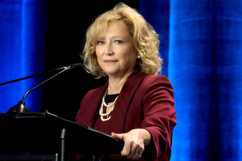 AcademyHealth CEO Lisa Simpson at the podium opening the 2018 AcademyHealth Annual Research Meeting in Seattle.