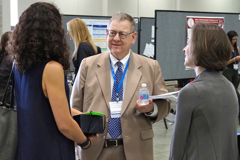 Jeffrey Silber, MD, PhD, talks with Rebecca Anhang Price, PhD, a Senior Policy Researcher at RAND, and Rachel Henke, PhD, Senior Director of Research at IBM Watson Health