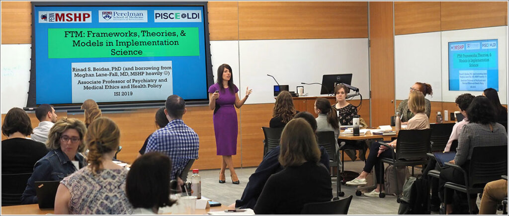 Director of the Penn Implementation Science Center Rinad Beidas, PhD, teaching an implementation science classroom group.