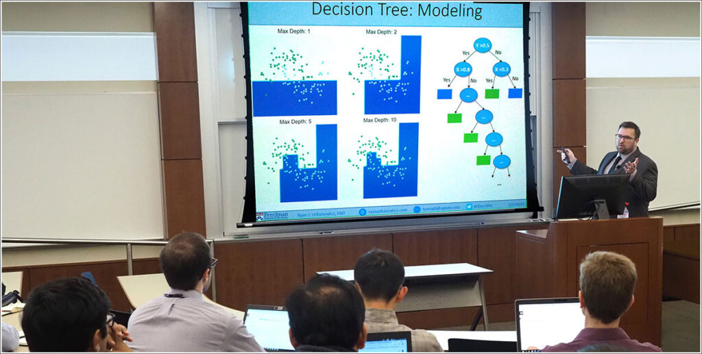 Ryan Urbanowicz conducts a machine learning class for health researcher faculty members at Penn