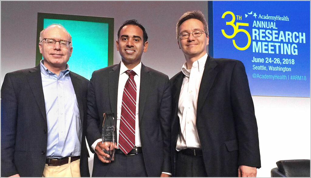 On stage at the 2018 AcademyHealth Annual Research Meeting are Penn Medicine's David Asch, MD, MBA, Mitesh Patel, MD, MBA, and Kevin Volpp, MD, PhD