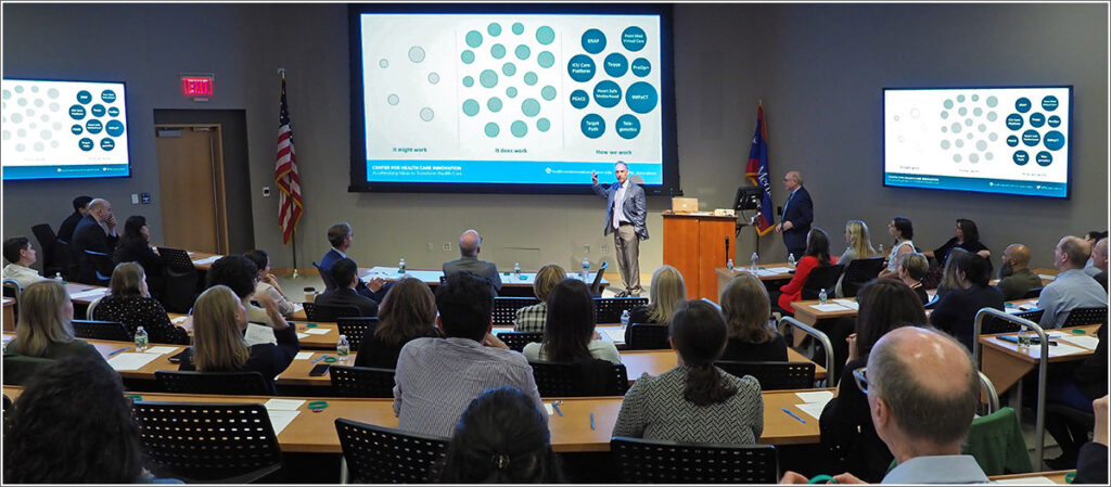 Penn Medicine Innovation Officer and LDI Senior Fellow Roy Rosin, MBA on stage for Pitch Day