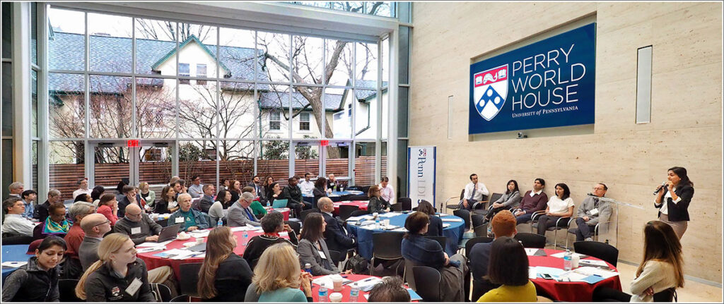 Inside a plenary session of the 7th Annual Penn Health Policy Retreat in Penn's Perry World House. Paula Chatterjee, MD, is at the podium.