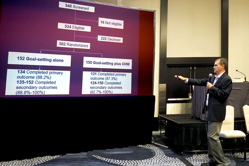 David Grande, MD, giving a presentation at a scientific conference