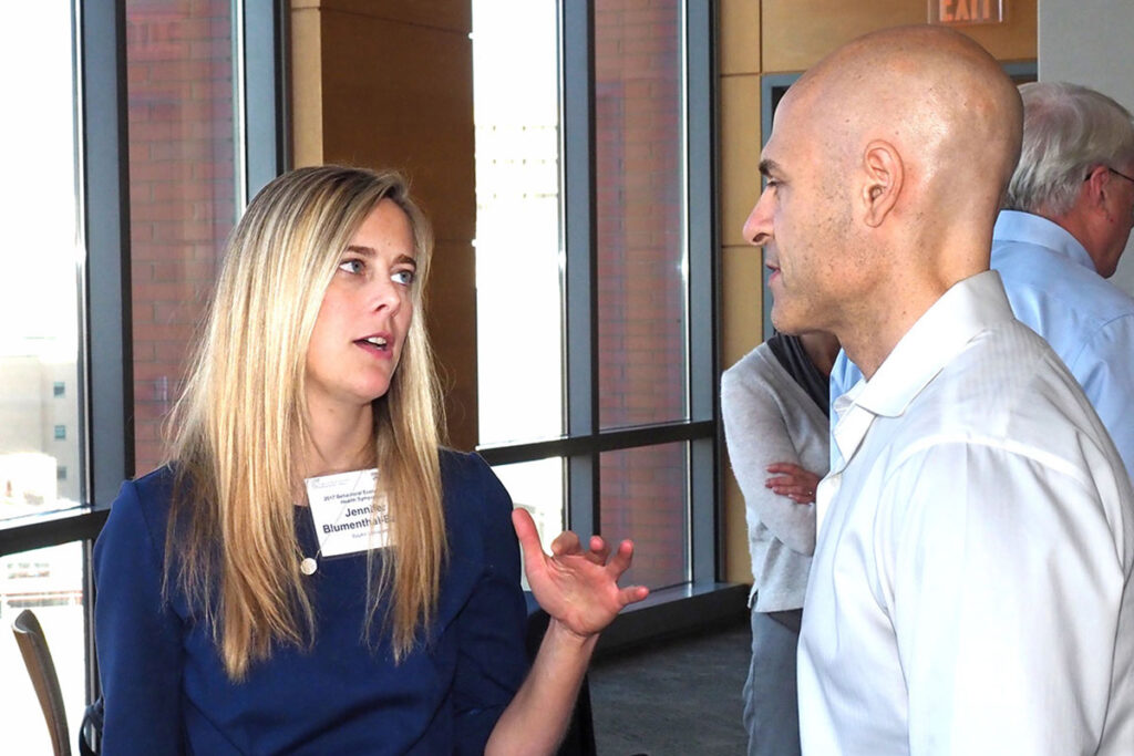 Jennifer Blumenthal-Barby, PhD, Associate Professor of Medical Ethics at Baylor College of Medicine makes a point with Scott Halpern, MD, PhD, Associate Professor of Medicine, Epidemiology, and Medical Ethics and Health Policy at the Perelman School
