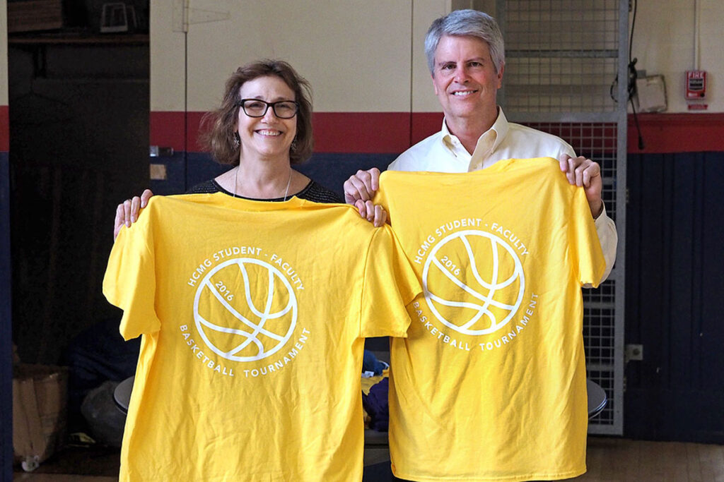Showing off this year's yellow and purple jerseys (above, right) are LDI Deputy Director and Associate Director of the Health Care Management and Economics PhD program Joanne Levy, and game coach and Wharton Health Care Management Professor Scott Harrington