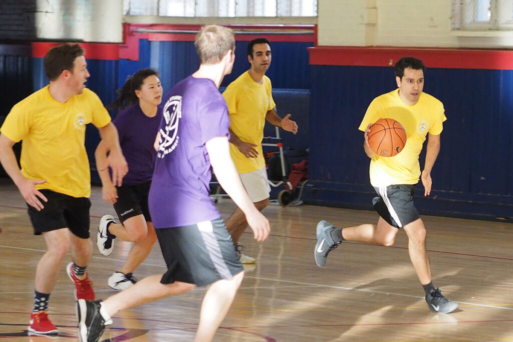 Shivan Mehta moves the basketball down the court
