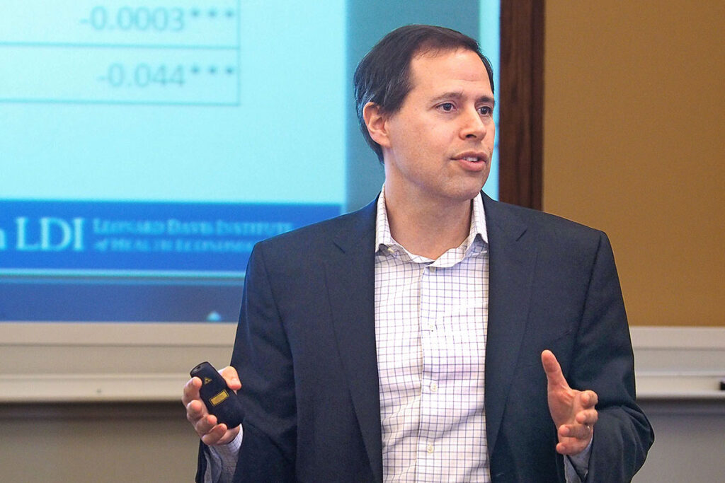 Daniel Polsky, PhD, addressing a meeting in the Penn Law School
