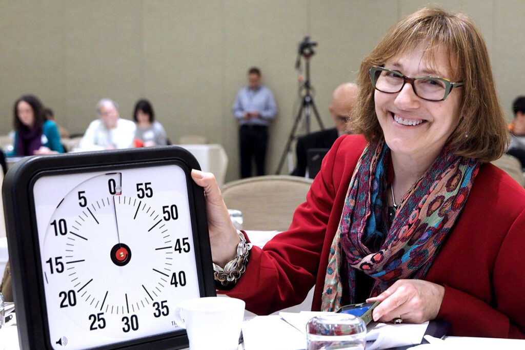 Joanne Levy, MBA, MCP, LDI Deputy Director, mans the timer that limits speakers at LDI events