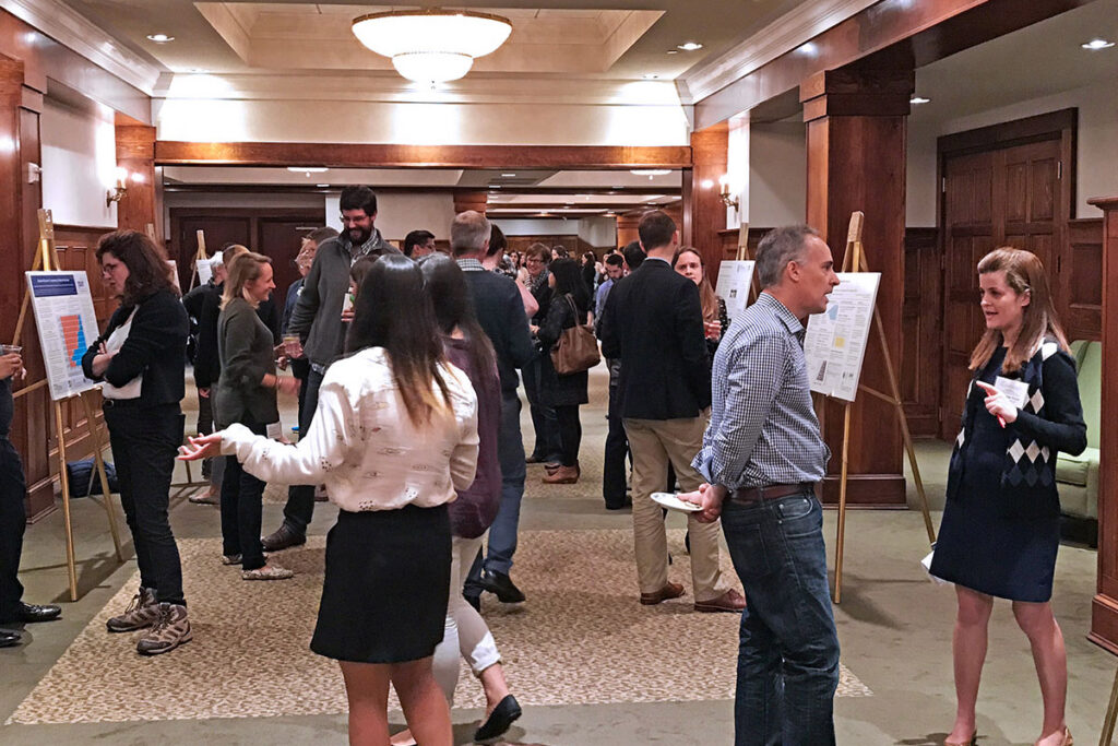 2017 Penn/CMU Retreat attendees browse the organization's first poster expo at its annual retreat