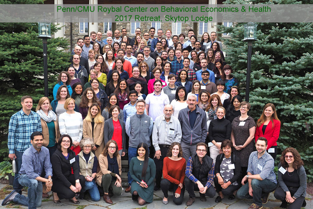 Group photo: 104 of the 112 attendees at the 2017 annual Roybal Behavioral Economics Retreat gather on the front steps of Skytop Lodge