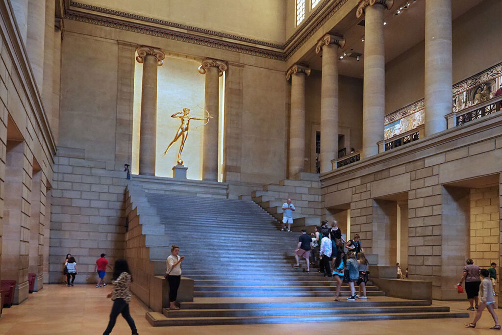 Golden sculpture Diana, Roman Goddess of the Hunt, at the top of the Philadelphia Museum of Art's central staircase