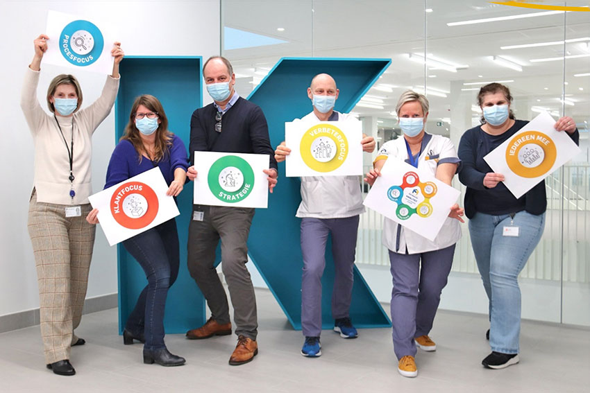 A Belgium hospital team celebrates the quality model they developed.