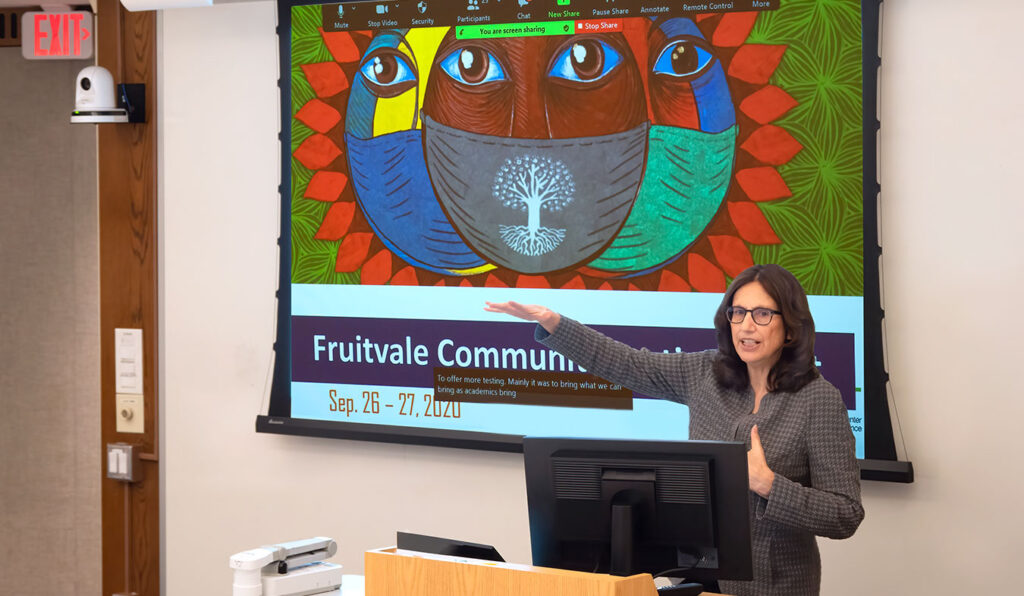 UCSF Professor Alicia Fernández at the podium in a University of Pennsylvania visit.