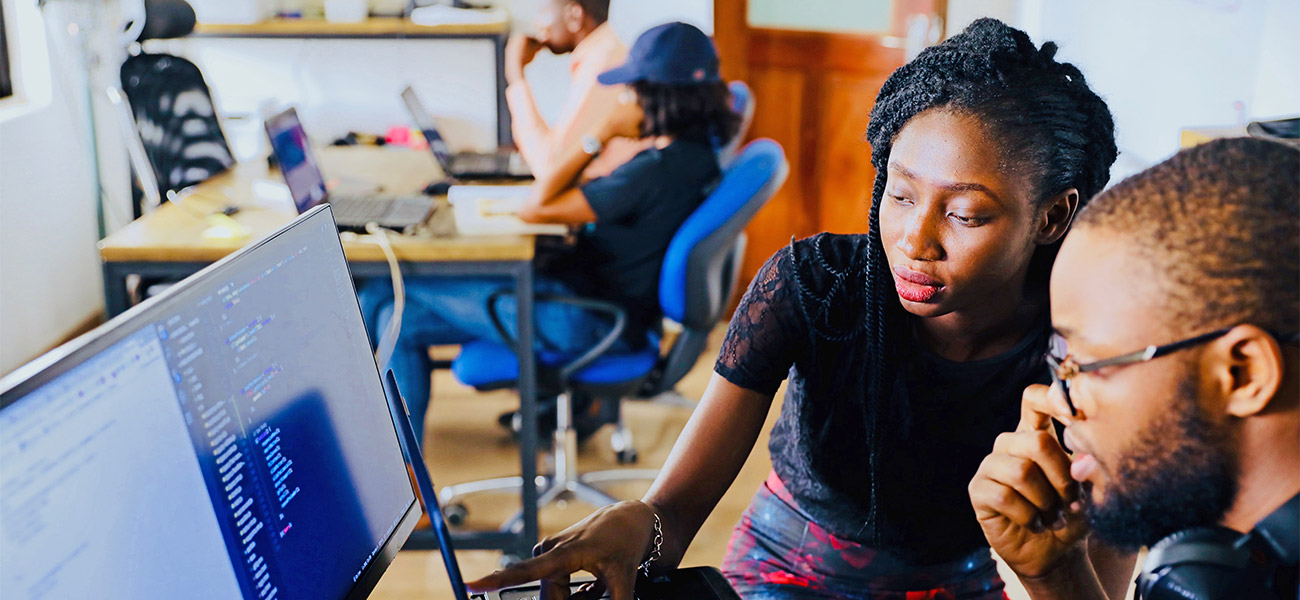 Two students working at a computer