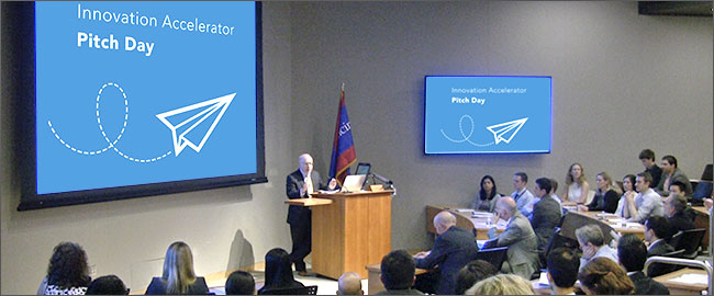 Executive Director of the Penn Center for Health Care Innovation David asch at the podium in Penn Medicine's 2017 "Pitch Day"